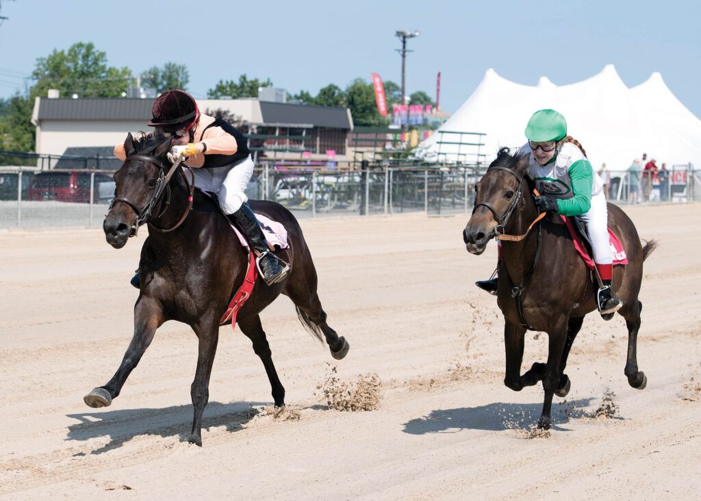 Roger That (Colin Smith) and Count Chocula (Ellie Nickel) racing